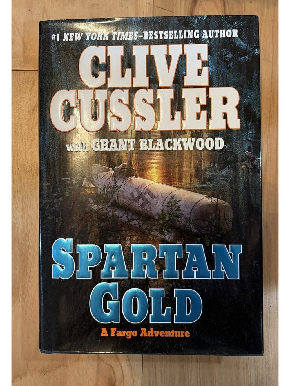 “Spartan Gold” by Clive Cussler and Grant Blackwood Hardcover Book